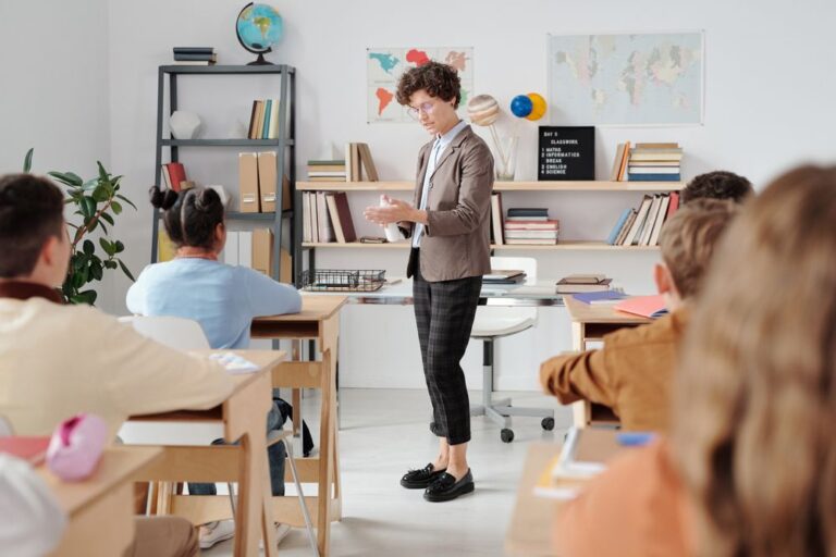 Tutor teaching students in a classroom