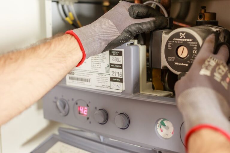 Plumber repairing a water heater
